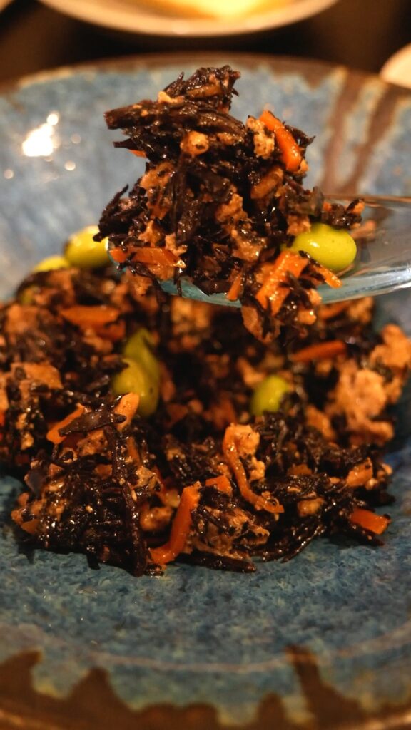 Hijiki seaweed dish served in a blue bowl