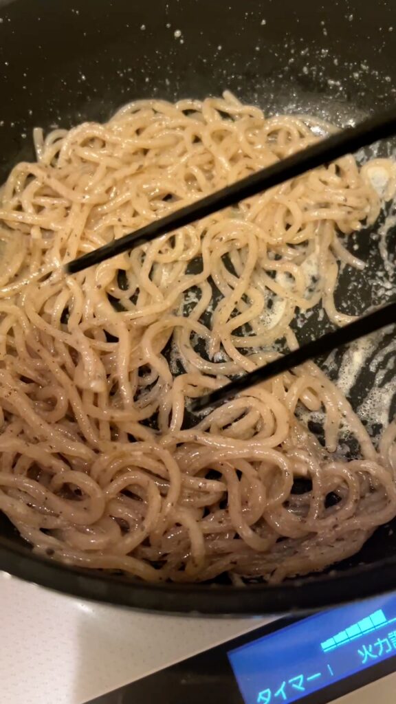 Stir-frying shirataki noodles to remove moisture