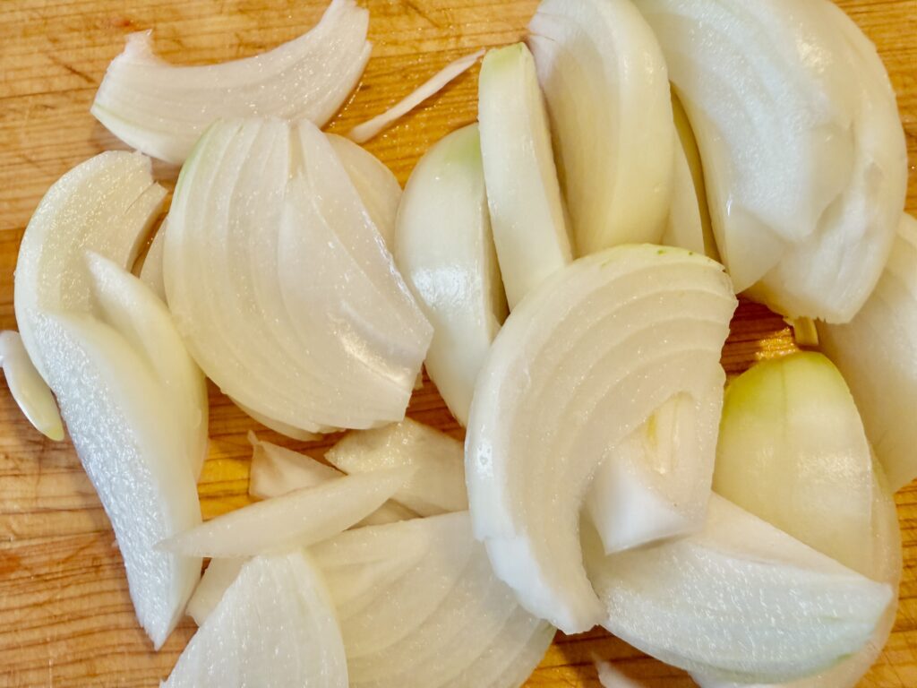 Japanese ginger pork (Shogayaki) prep: cut the onion into wedges